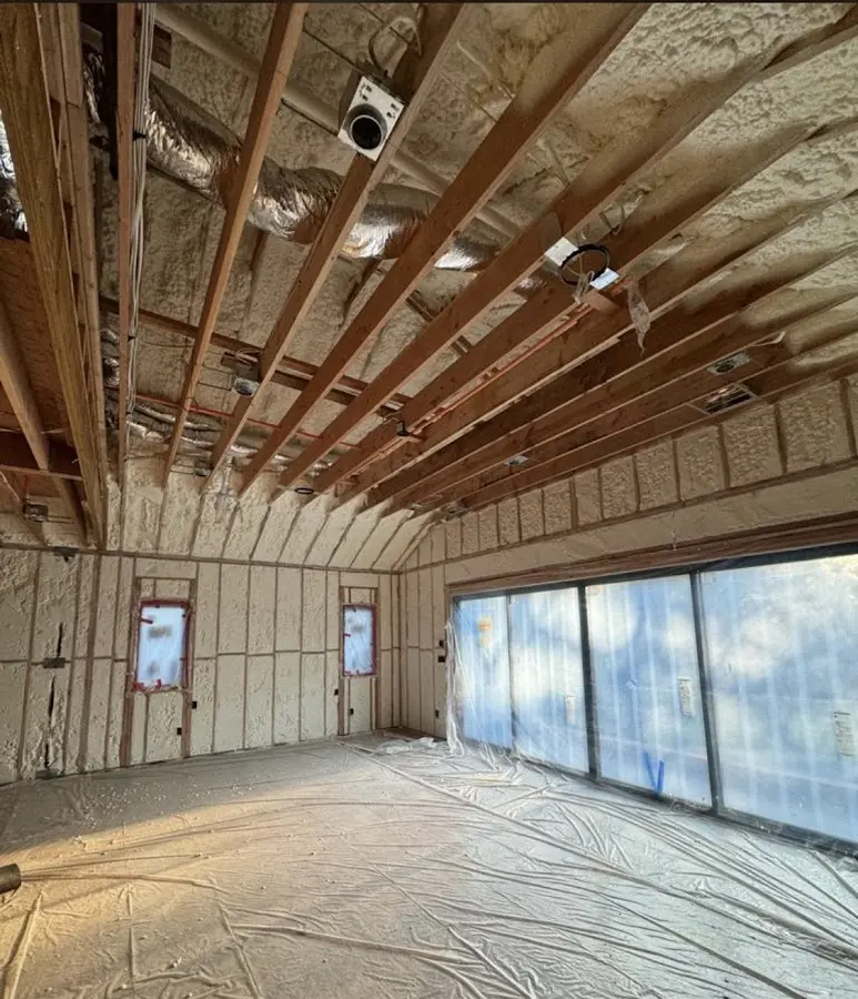 Interior walls and ceiling insulated with spray foam during new construction in Levelland