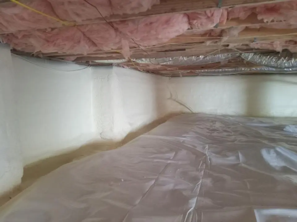 Crawl space encapsulation with closed-cell spray foam for Commercial Roof Restoration in Levelland